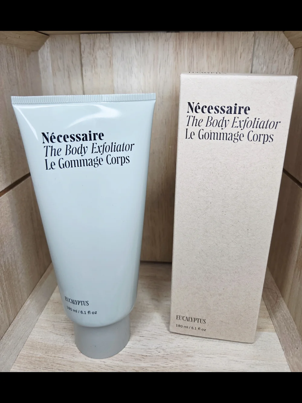Nécessaire The Body Exfoliator in the Eucalyptus scent (6.1 fl oz / 180 ml).